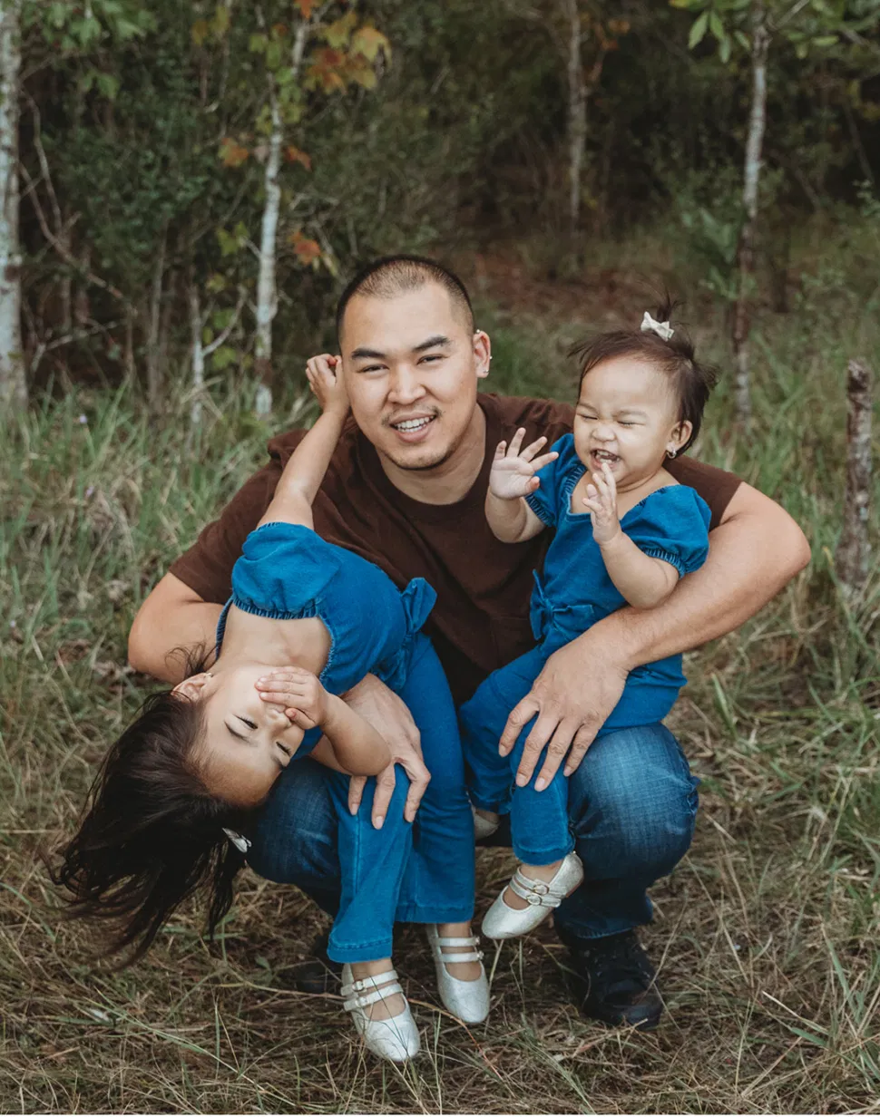 Andy with his two daughters